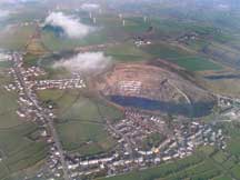 Aerial view of Delabole showing the windfarm at the top of the picture